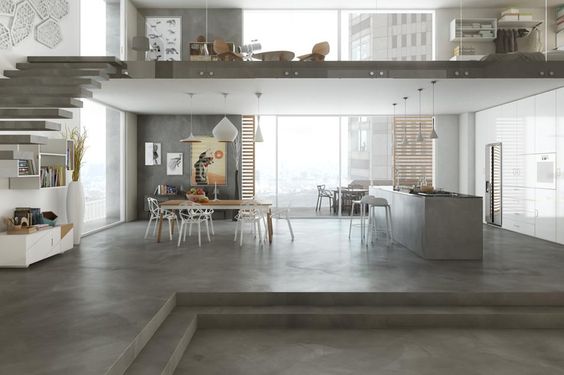 casa con pavimenti in cemento per interni ed esterni